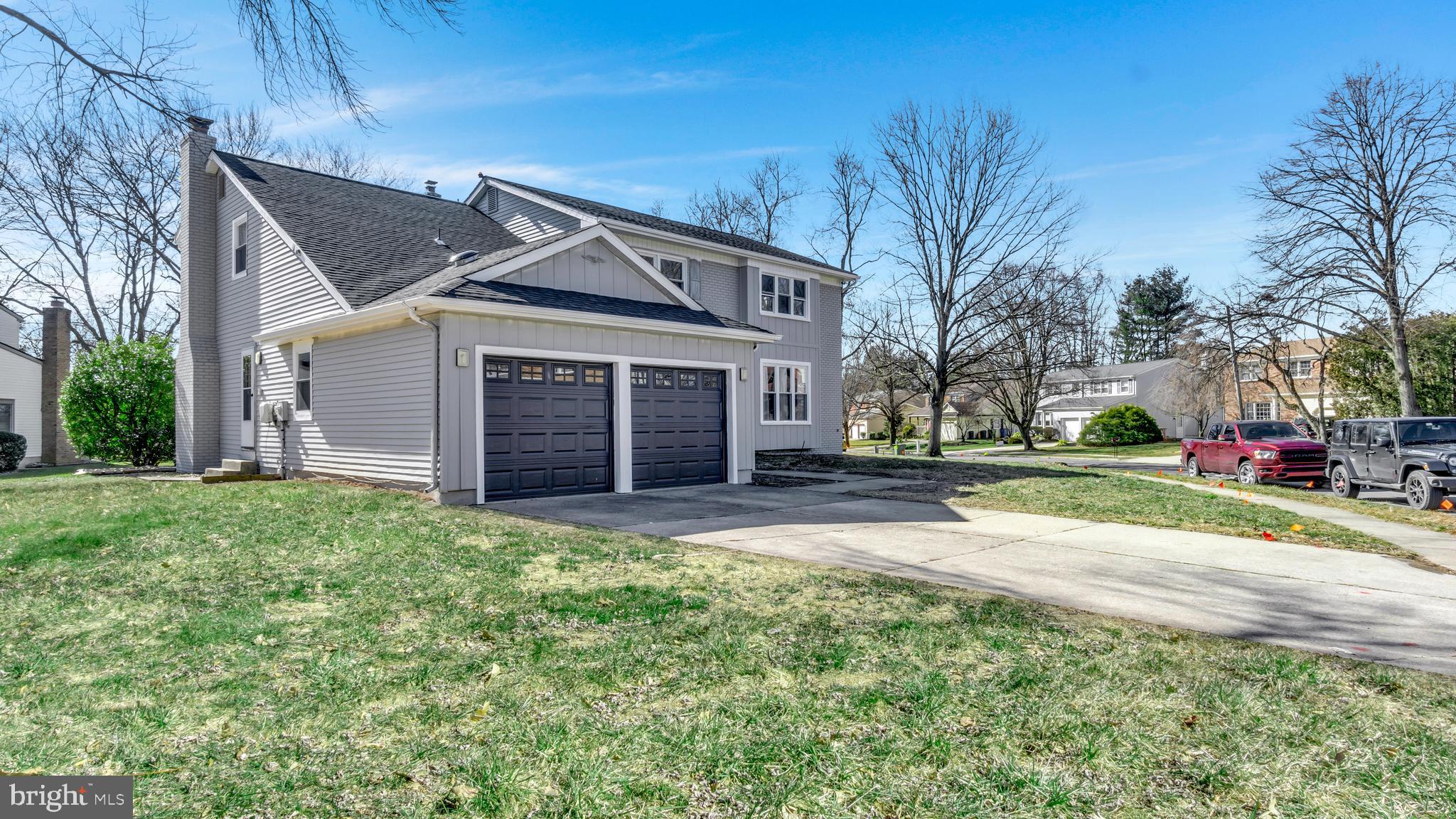 514 Arthur Drive Cherry Hill, NJ 08003 - Photo 2 of 33 a view of a house with a yard and garage