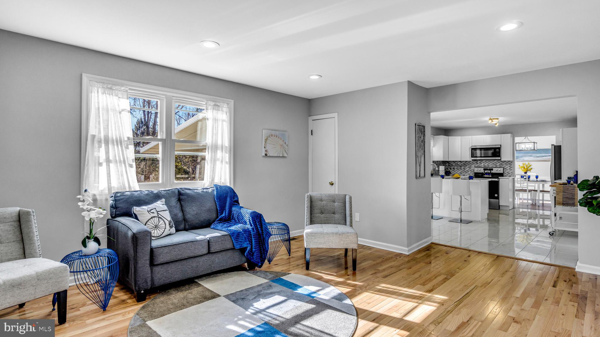 514 Arthur Drive Cherry Hill, NJ 08003 - Photo 17 of 33 a living room with furniture and a large window