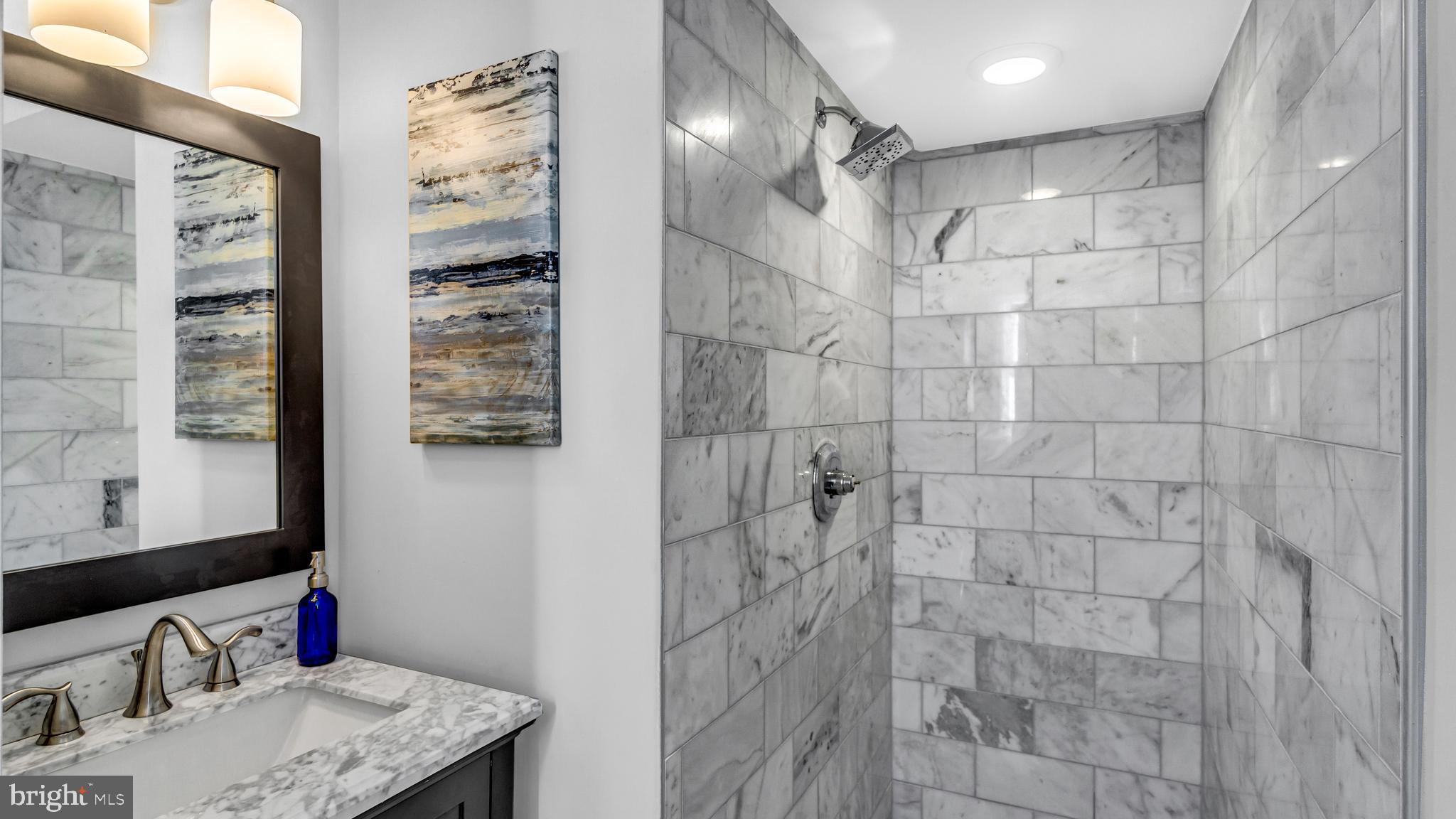 514 Arthur Drive Cherry Hill, NJ 08003 - Photo 28 of 33 a bathroom with a sink vanity and shower