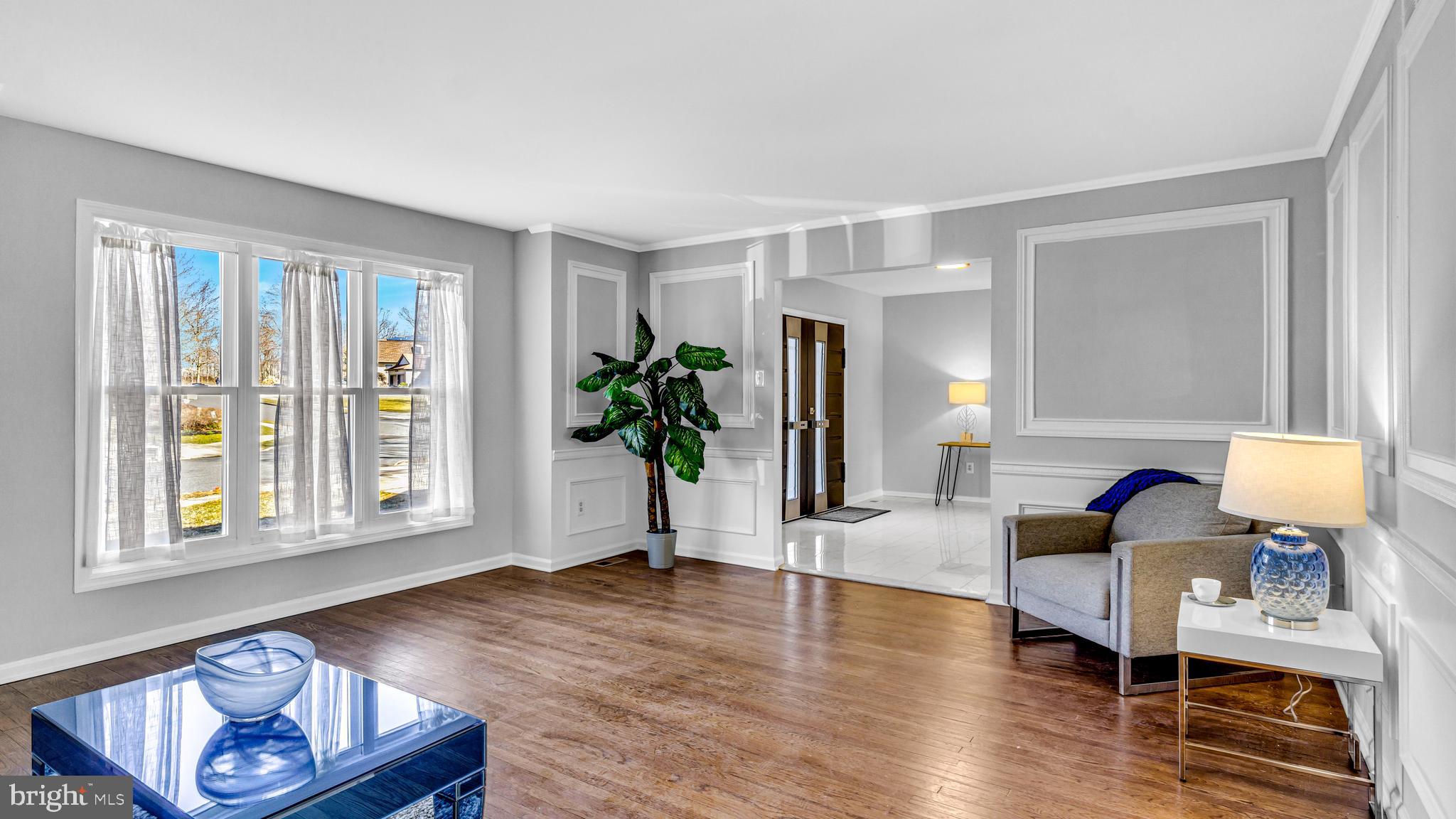 514 Arthur Drive Cherry Hill, NJ 08003 - Photo 7 of 33 a living room with furniture and a potted plant