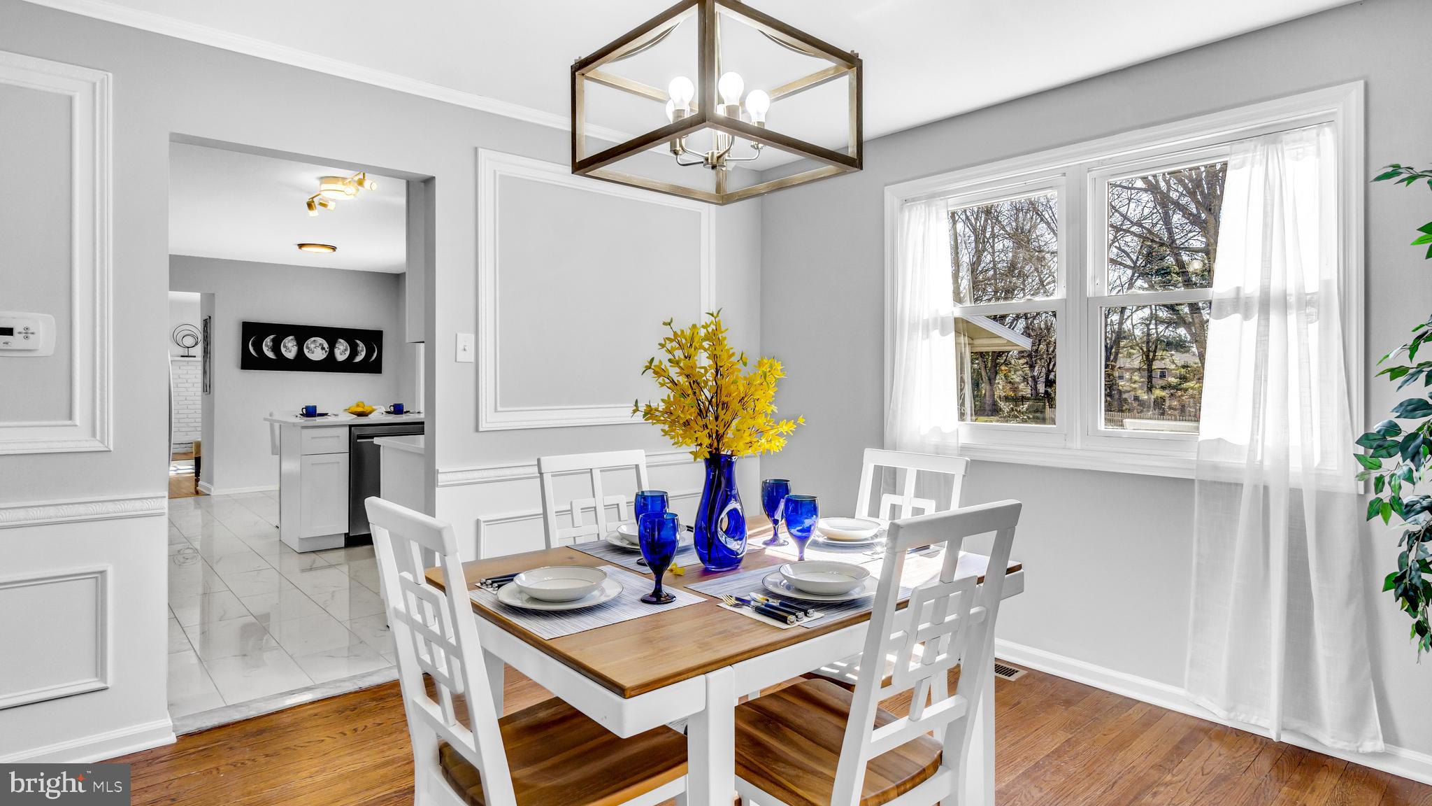 514 Arthur Drive Cherry Hill, NJ 08003 - Photo 10 of 33 a view of a dining room with furniture and wooden floor