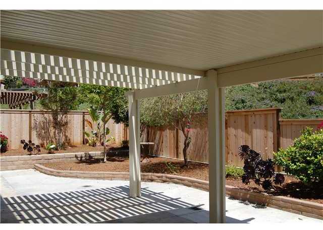 925 Alyssum Road Carlsbad, CA 92011 - Photo 6 of 10 Covered back patio. Easy care back yard.