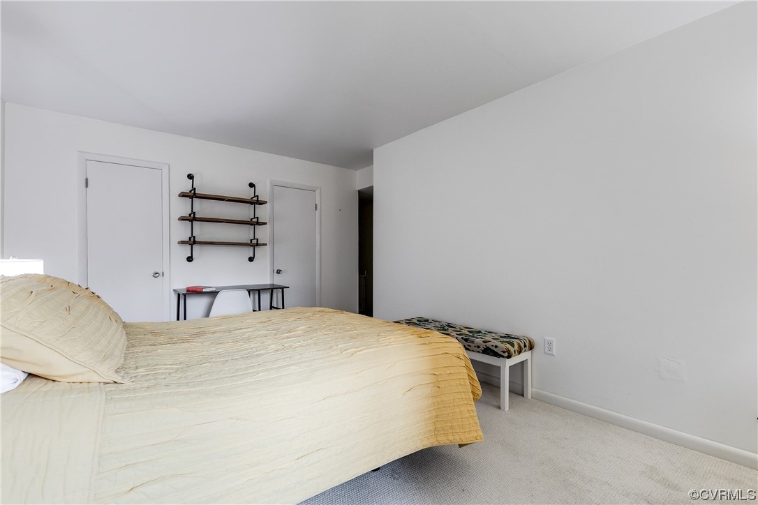 1509 Regency Woods Road, Unit 103 Henrico, VA 23238 - Photo 19 of 31 a bedroom with a bed and closet