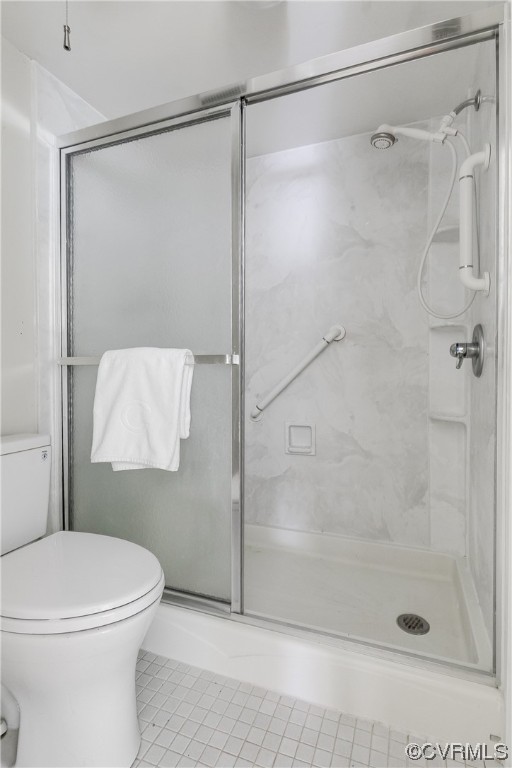 1509 Regency Woods Road, Unit 103 Henrico, VA 23238 - Photo 22 of 31 a bathroom with a shower and a toilet