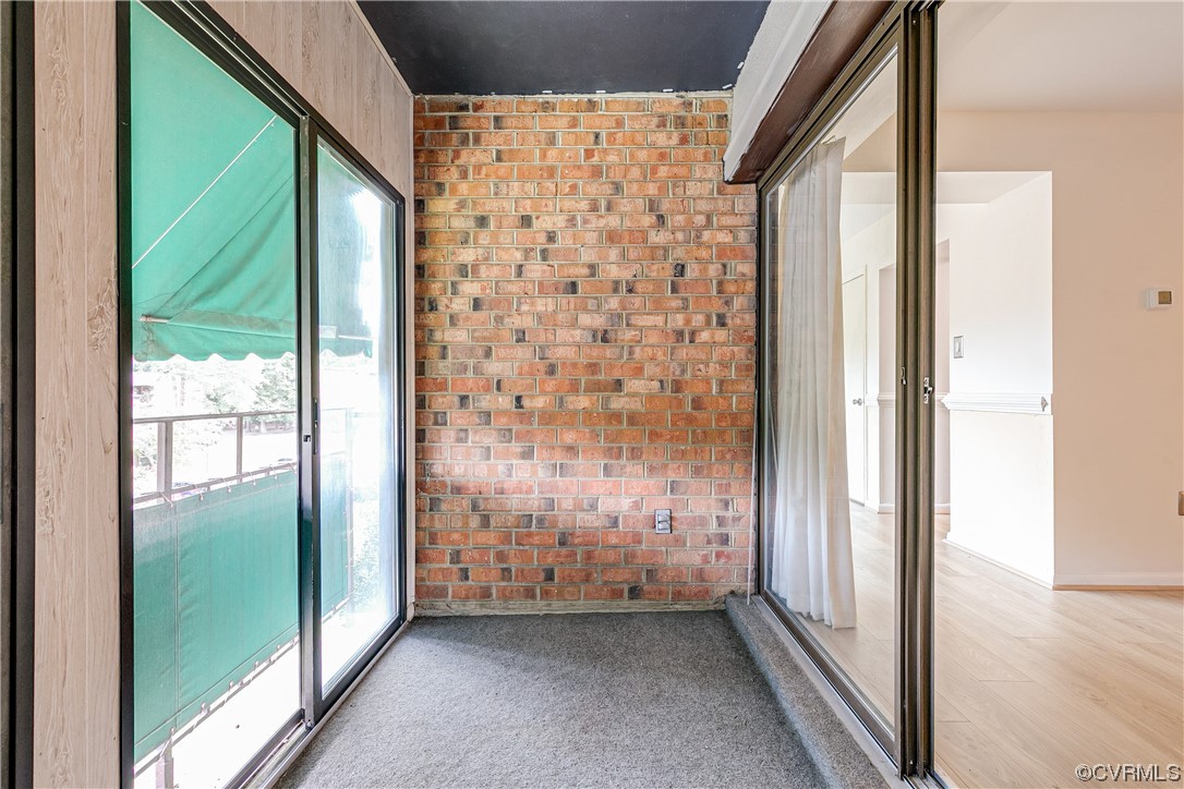 1509 Regency Woods Road, Unit 103 Henrico, VA 23238 - Photo 6 of 31 a view of a glass door and porch