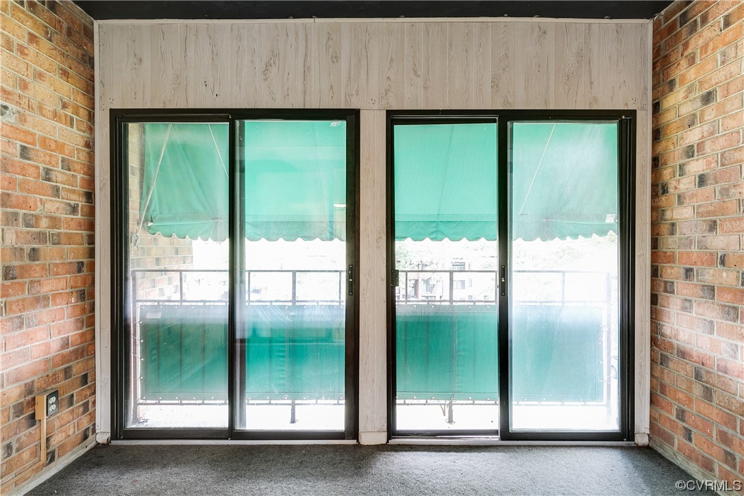 1509 Regency Woods Road, Unit 103 Henrico, VA 23238 - Photo 7 of 31 a view of a large window with an outdoor area