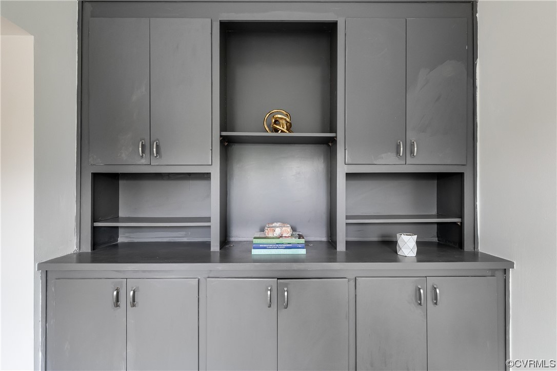 1509 Regency Woods Road, Unit 103 Henrico, VA 23238 - Photo 9 of 31 a kitchen with a refrigerator and cabinets