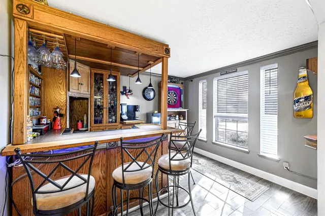 a dinning table and chairs in a room