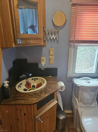 a kitchen with a sink and refrigerator
