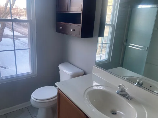 a bathroom with a sink and a toilet