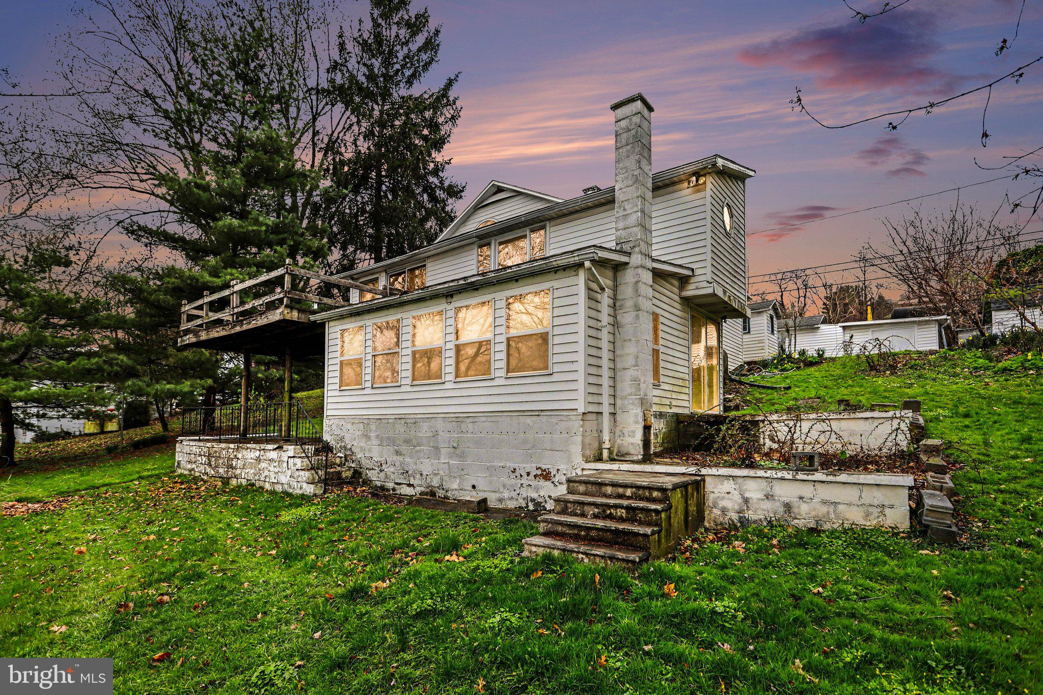 924 River Road Marysville, PA 17053 - Photo 2 of 32 a front view of a house with a garden
