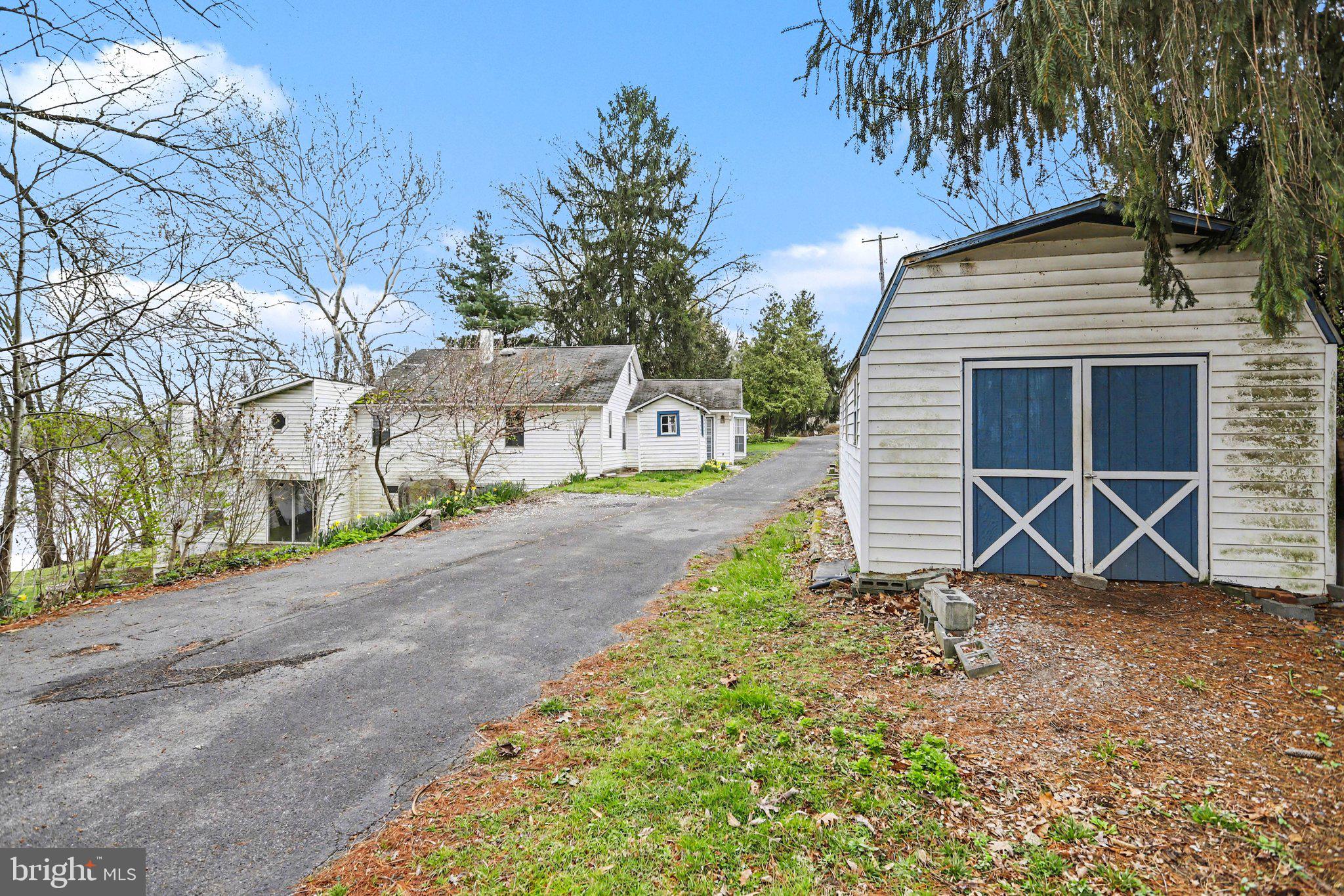 924 River Road Marysville, PA 17053 - Photo 27 of 32 a view of a house with a yard and potted plants