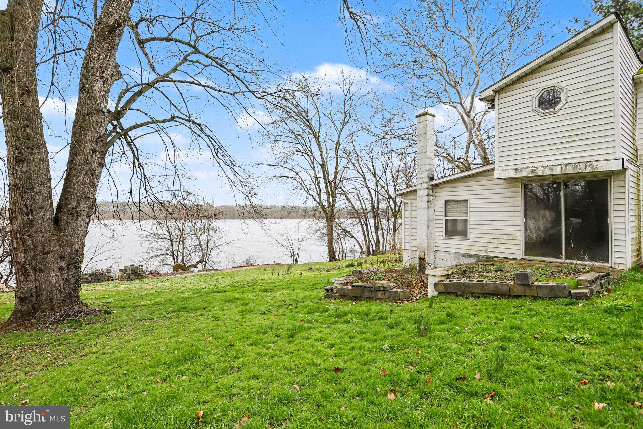 924 River Road Marysville, PA 17053 - Photo 30 of 32 a backyard of a house with table and chairs