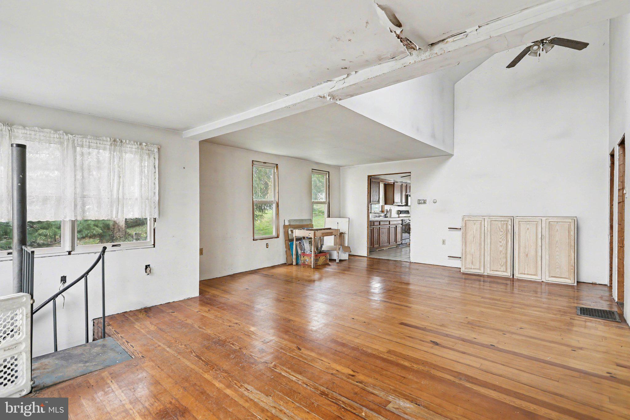 924 River Road Marysville, PA 17053 - Photo 9 of 32 a view of empty room with wooden floor and windows