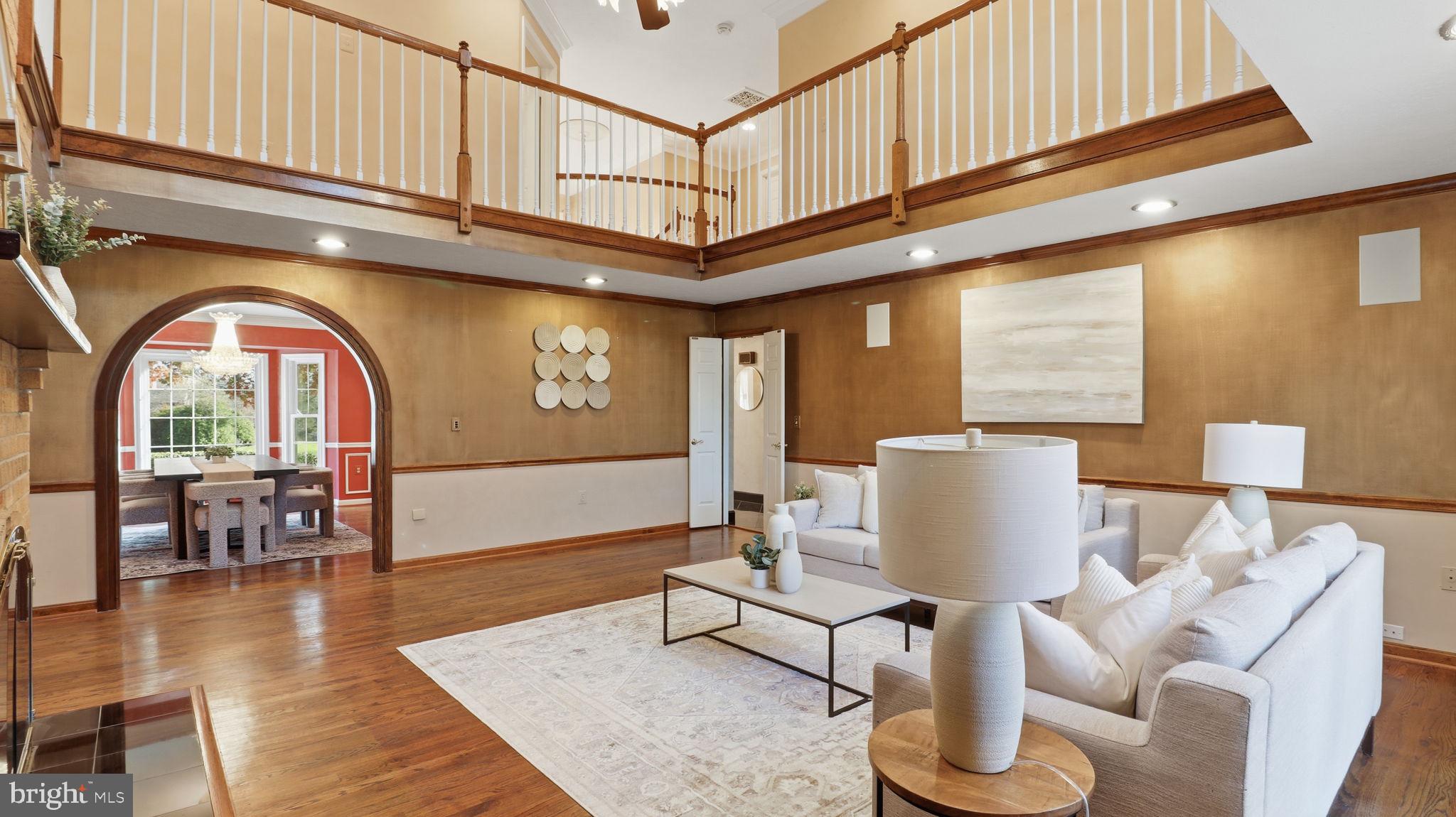12302 Prospect Landing Bowie, MD 20721 - Photo 16 of 104 a living room with furniture a window and a potted plant