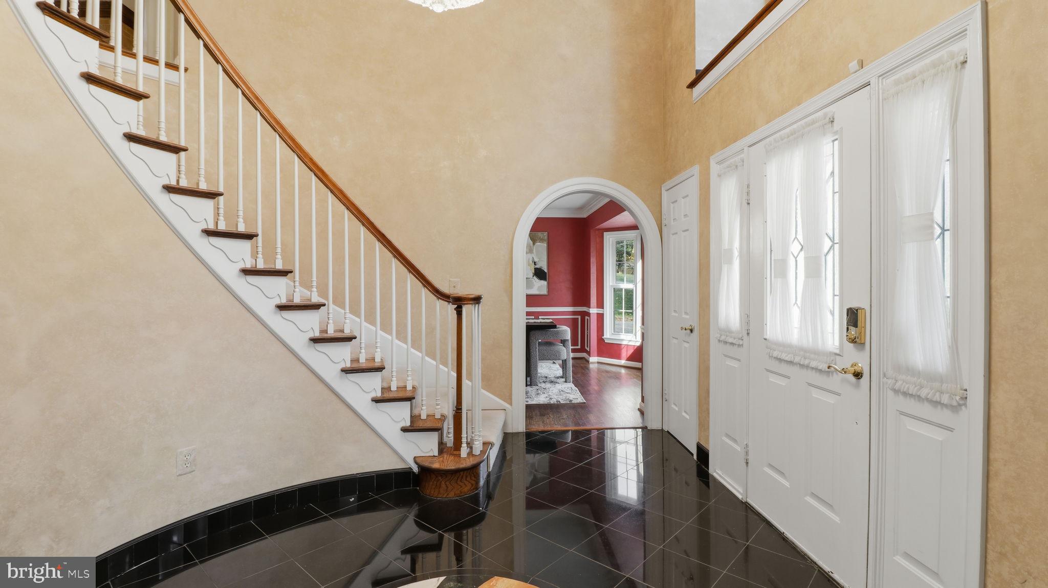 12302 Prospect Landing Bowie, MD 20721 - Photo 6 of 104 a view of entryway and hall with wooden floor