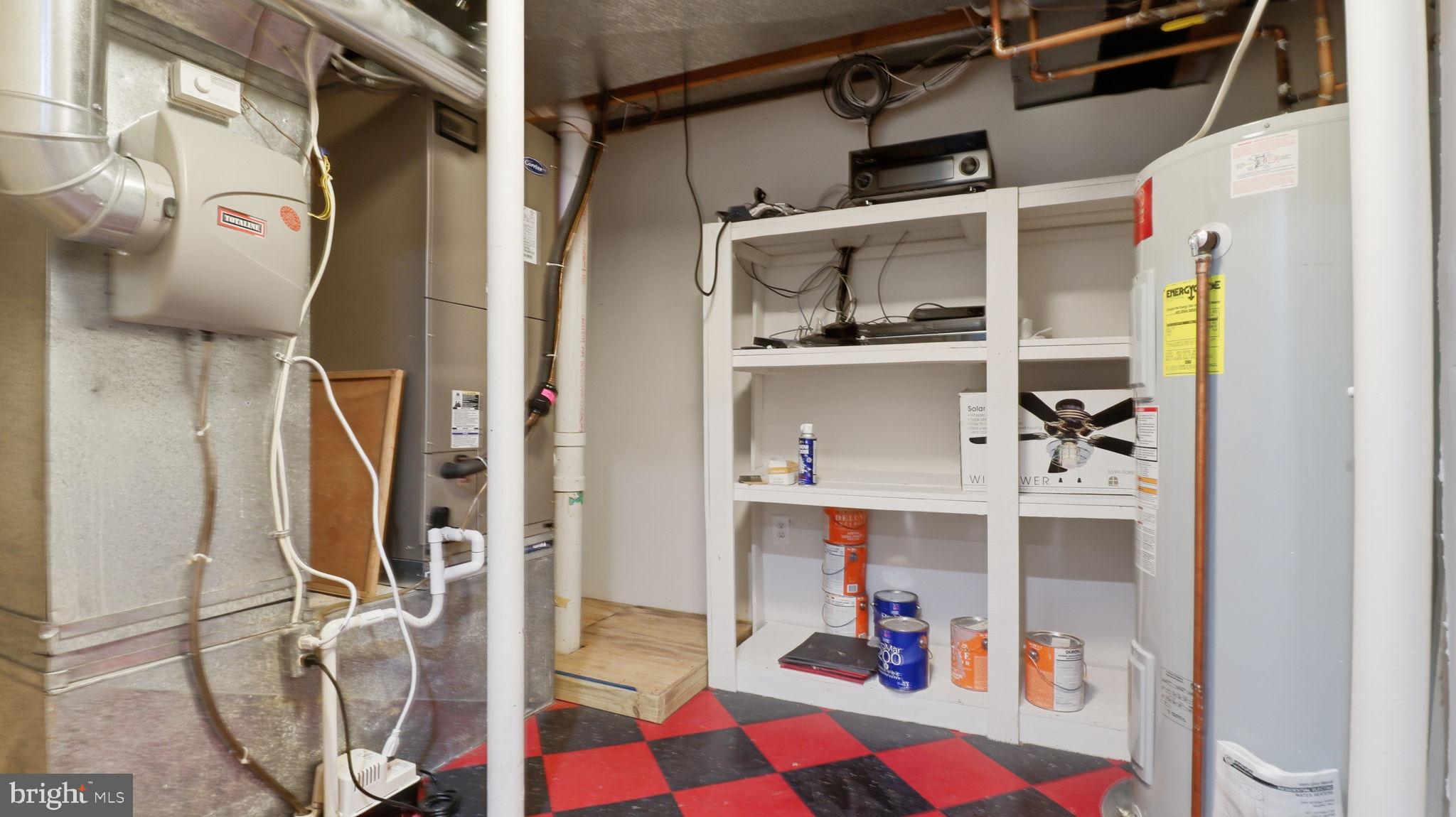 12302 Prospect Landing Bowie, MD 20721 - Photo 85 of 104 a view of walk in closet with clothes and shoes
