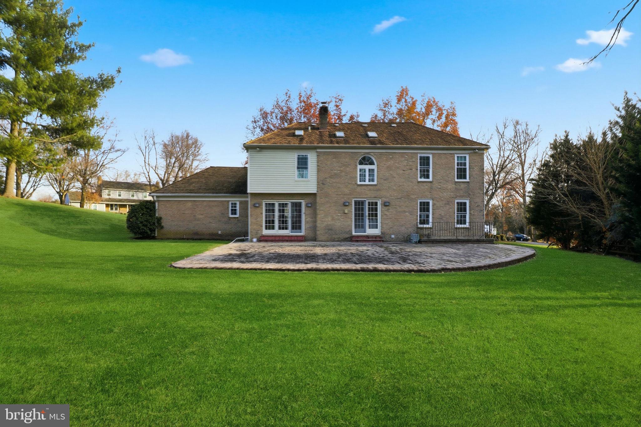12302 Prospect Landing Bowie, MD 20721 - Photo 87 of 104 a view of a house with a yard and a garden
