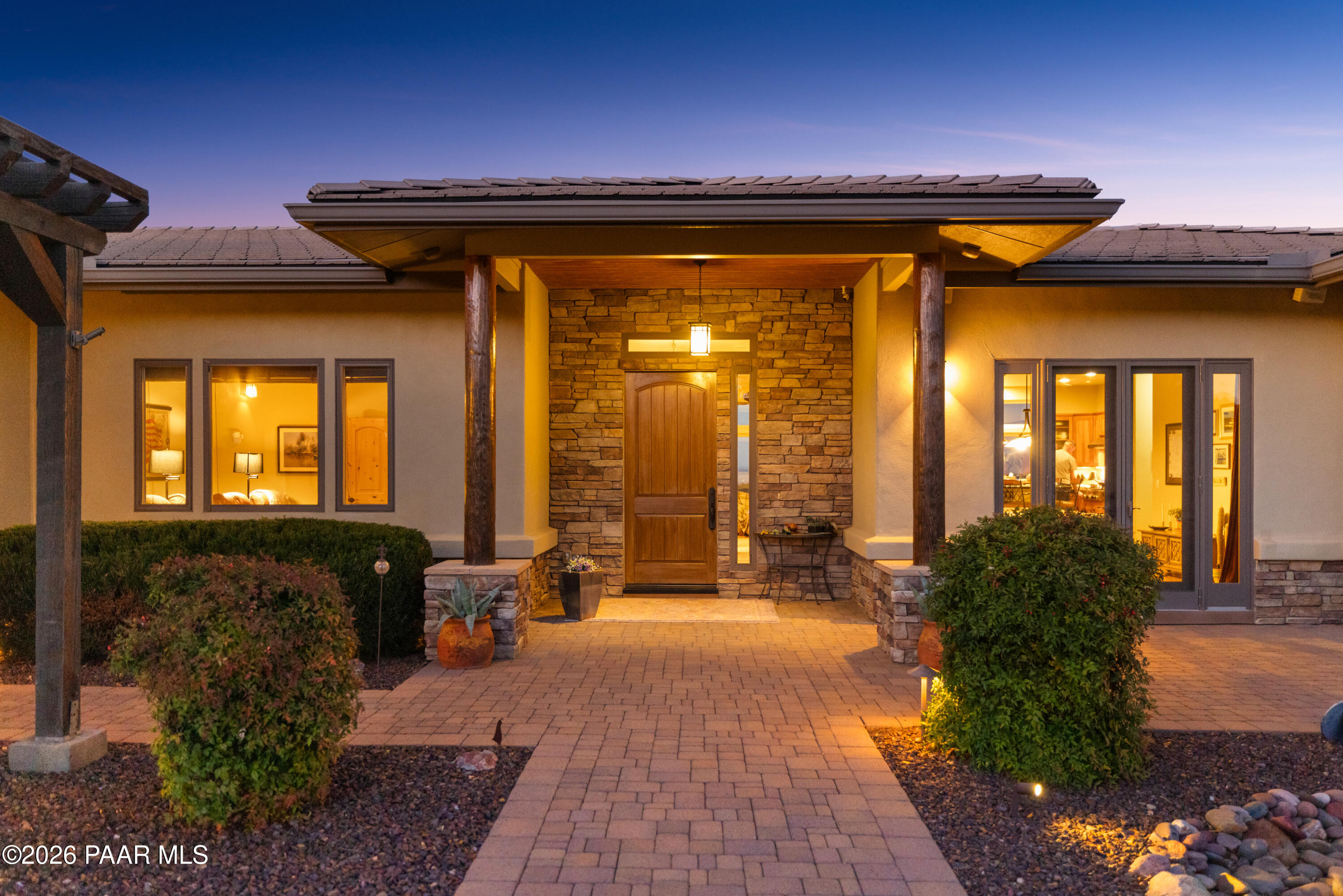 1448 Short Point Lane Prescott, AZ 86305 - Photo 46 of 56 a front view of a house with outdoor seating