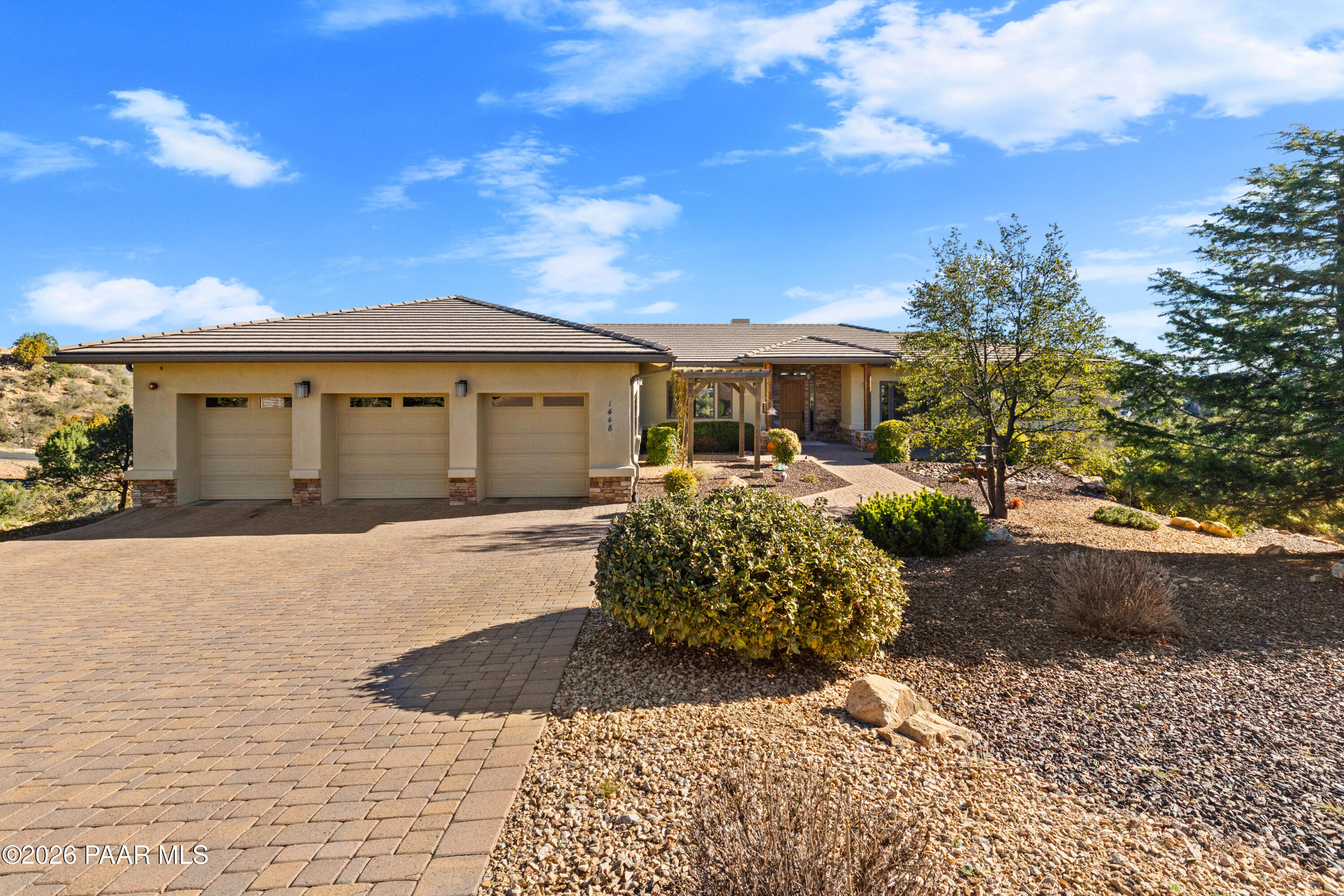 1448 Short Point Lane Prescott, AZ 86305 - Photo 10 of 56 a front view of a house with a yard