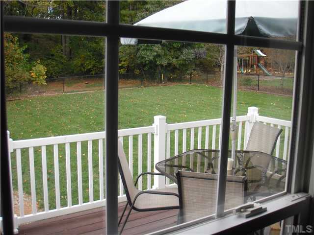 190 Punch Hill Farm Road Rougemont, NC 27572 - Photo 12 of 20 a view of a chair and table in the porch
