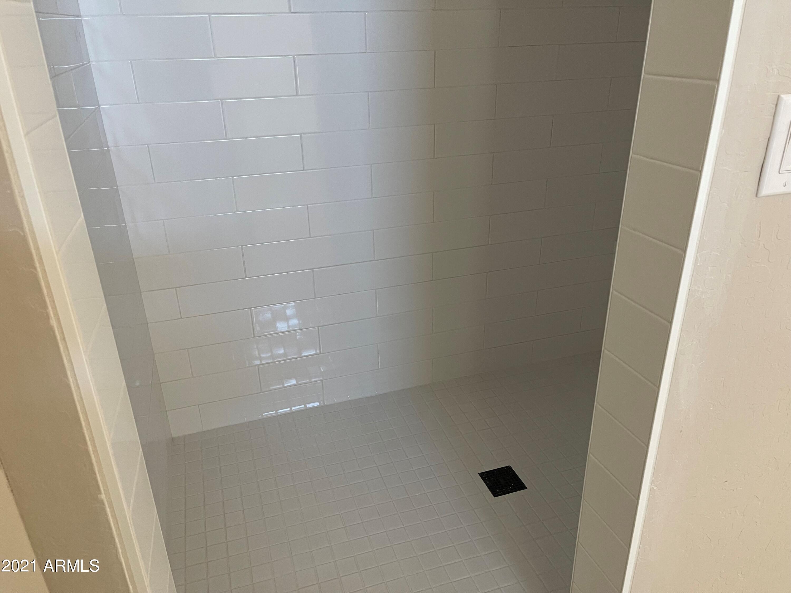 513 West Cloud Road Phoenix, AZ 85086 - Photo 14 of 17 Subway Tile in Primary Bathroom
