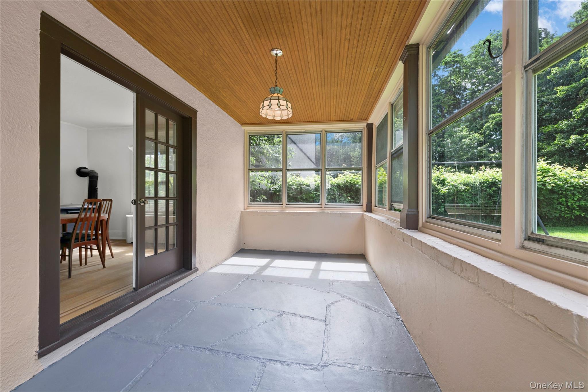 17 Old Orchard Road New Rochelle, NY 10804 - Photo 23 of 32 a view of hallway with a large window and dining room