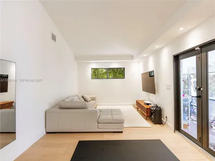 a view of a workspace with furniture