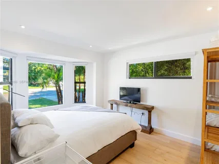 a view of a workspace with furniture