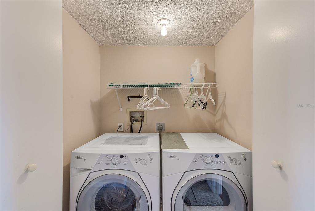615 Garland Circle Indian Rocks Beach, FL 33785 - Photo 30 of 52 a utility room with dryer and washer