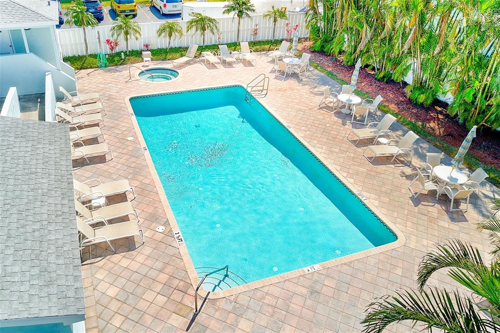 615 Garland Circle Indian Rocks Beach, FL 33785 - Photo 41 of 52 a view of a swimming pool with a patio