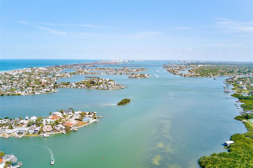 615 Garland Circle Indian Rocks Beach, FL 33785 - Photo 42 of 52 a view of a lake with a city