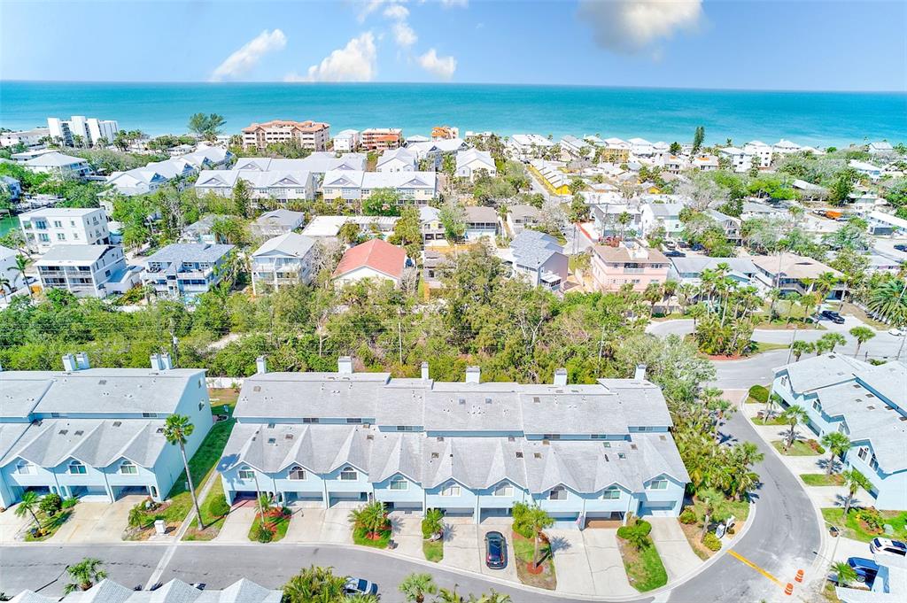 615 Garland Circle Indian Rocks Beach, FL 33785 - Photo 45 of 52 an aerial view of a house with a swimming pool an outdoor seating