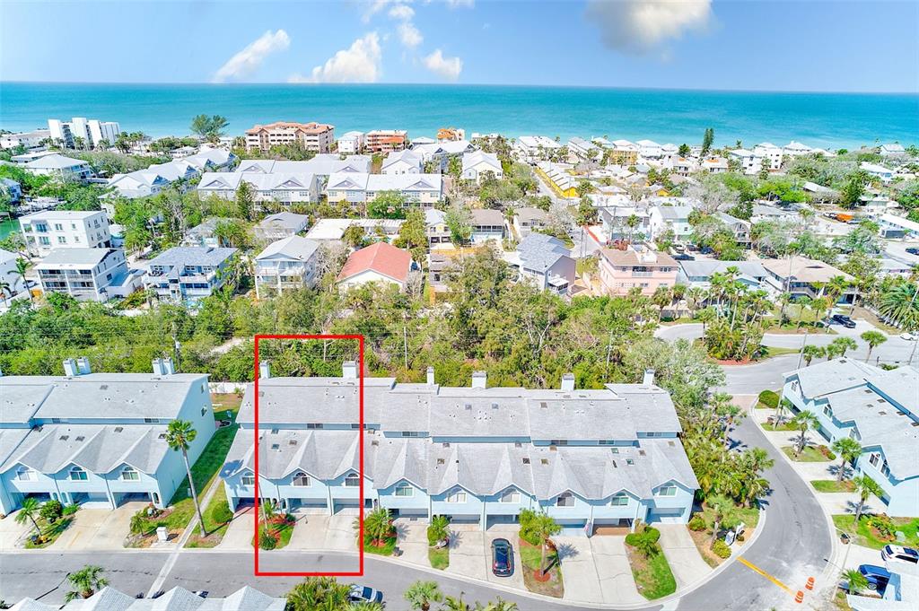 615 Garland Circle Indian Rocks Beach, FL 33785 - Photo 48 of 52 an aerial view of residential houses with outdoor space and swimming pool