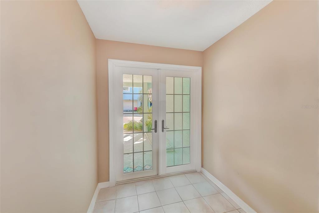 615 Garland Circle Indian Rocks Beach, FL 33785 - Photo 8 of 52 a view of an empty room and window