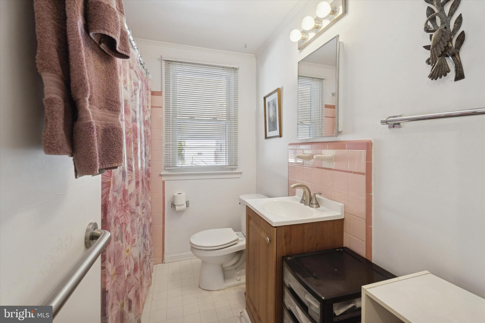 2305 Triebel Road Abington, PA 19001 - Photo 8 of 19 a bathroom with a sink toilet and vanity