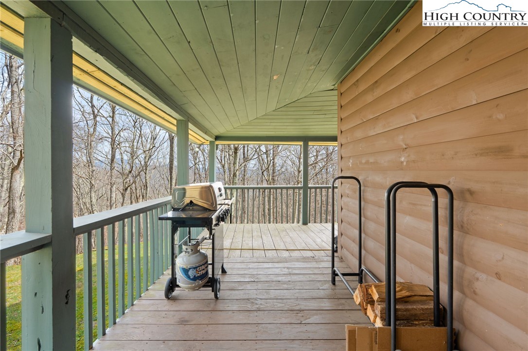1748 Junaluska Road Boone, NC 28607 - Photo 28 of 37 a view of a balcony with chairs