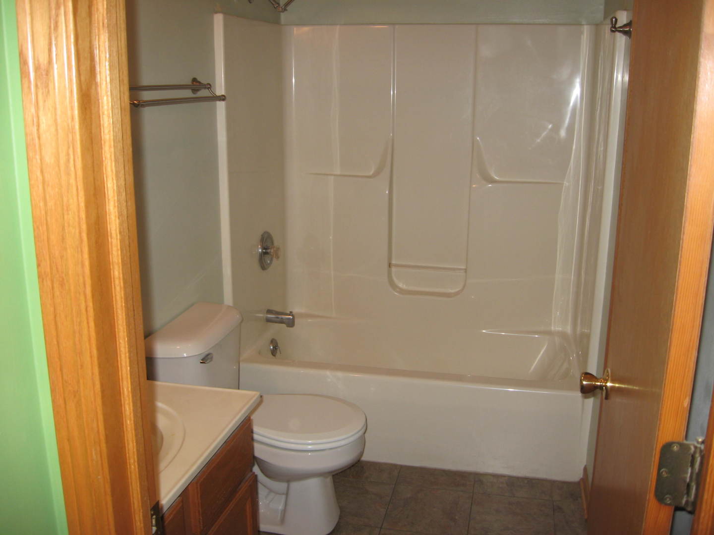 446 South Peace Road Sycamore, IL 60178 - Photo 12 of 12 a bathroom with a sink a toilet and shower