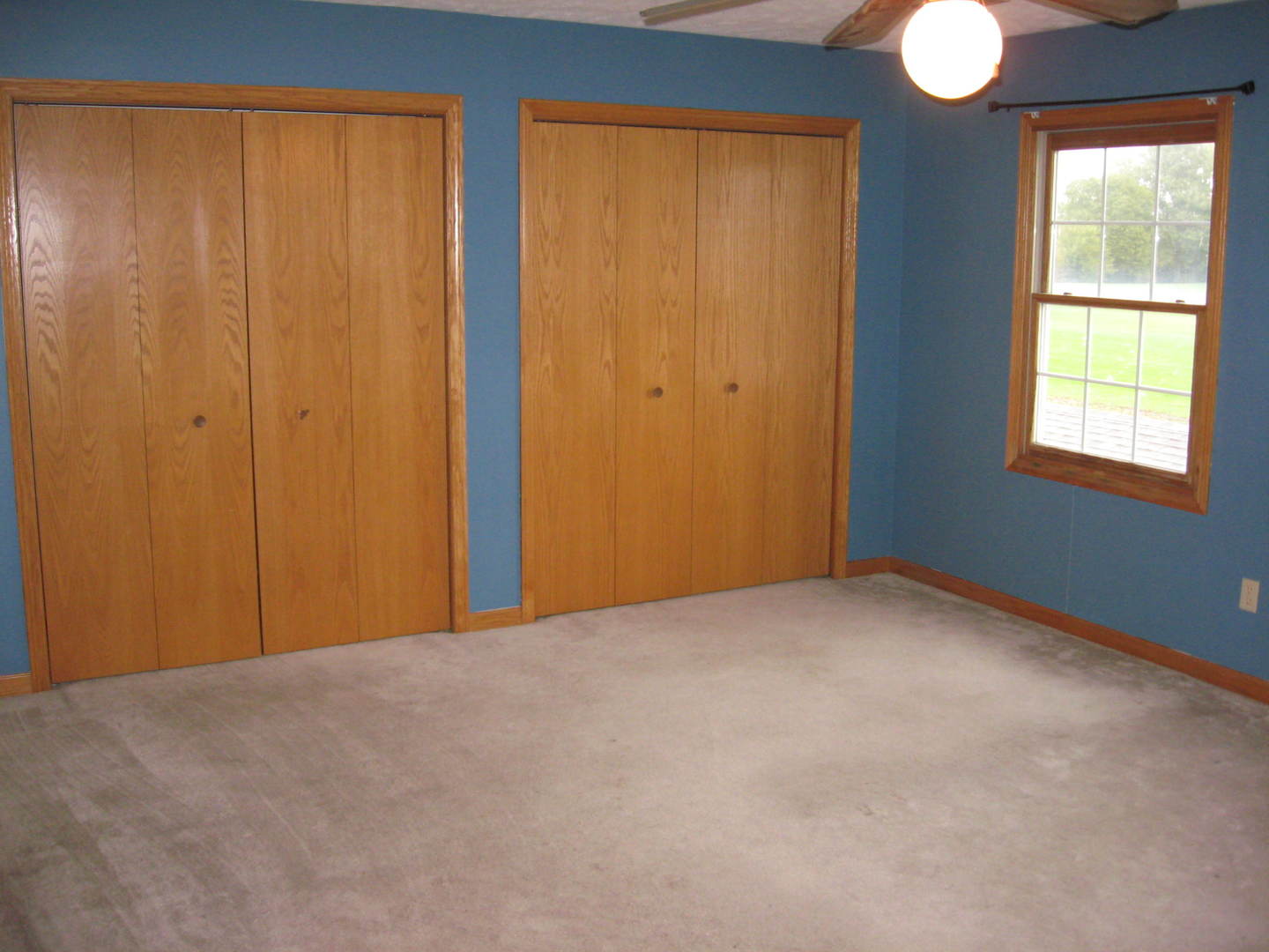 446 South Peace Road Sycamore, IL 60178 - Photo 9 of 12 a view of empty room with windows and closet