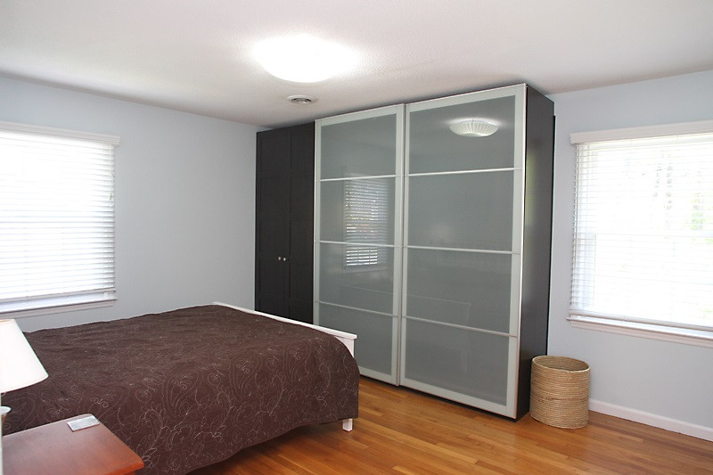 905 Tyrrell Road Raleigh, NC 27609 - Photo 9 of 13 Great Master with Furniture closet that stays! Hdwds in here, too! Master Bedroom
