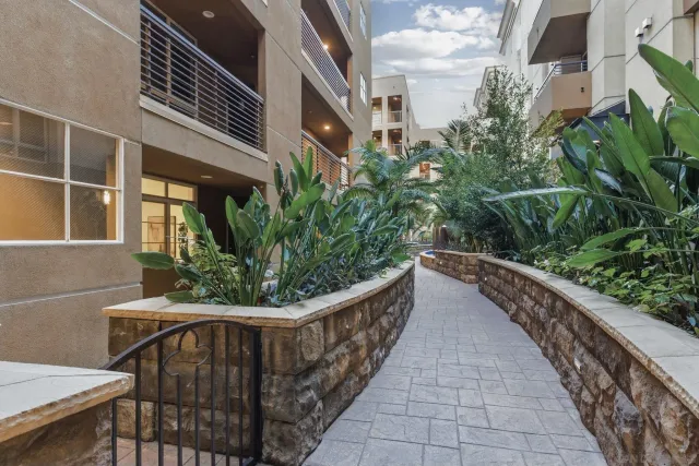 a view of balcony with furniture