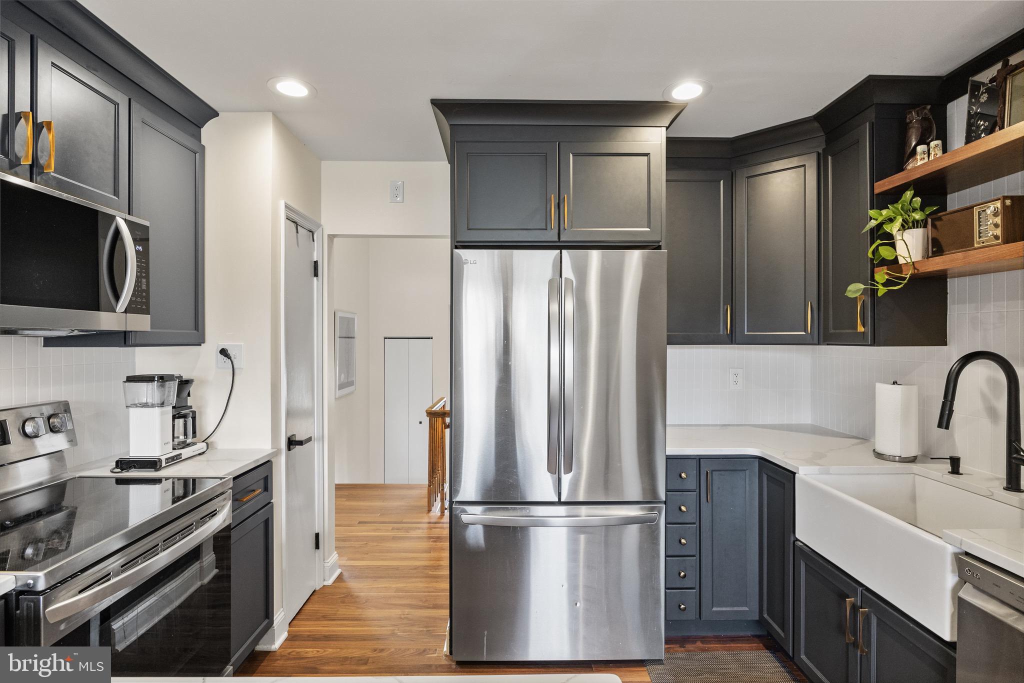 169 Canterbury Road Mount Laurel, NJ 08054 - Photo 11 of 47 a kitchen with stainless steel appliances a refrigerator sink and microwave