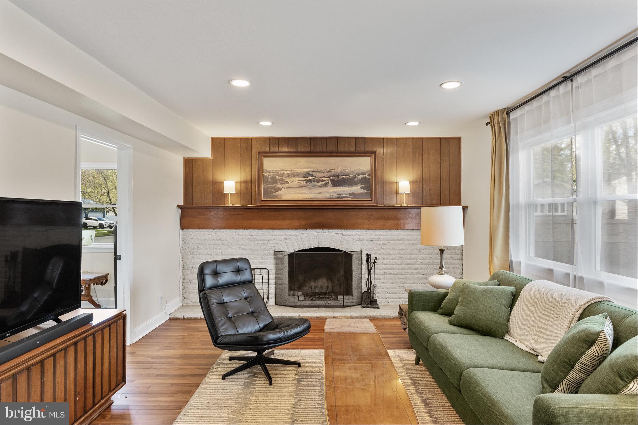 169 Canterbury Road Mount Laurel, NJ 08054 - Photo 16 of 47 a living room with furniture and a fireplace
