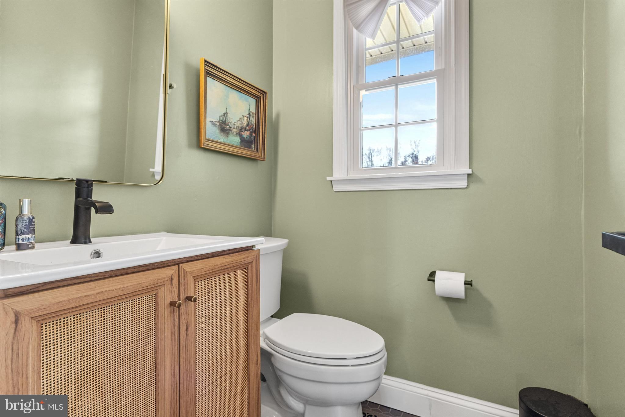 169 Canterbury Road Mount Laurel, NJ 08054 - Photo 20 of 47 a bathroom with a toilet a sink and a window