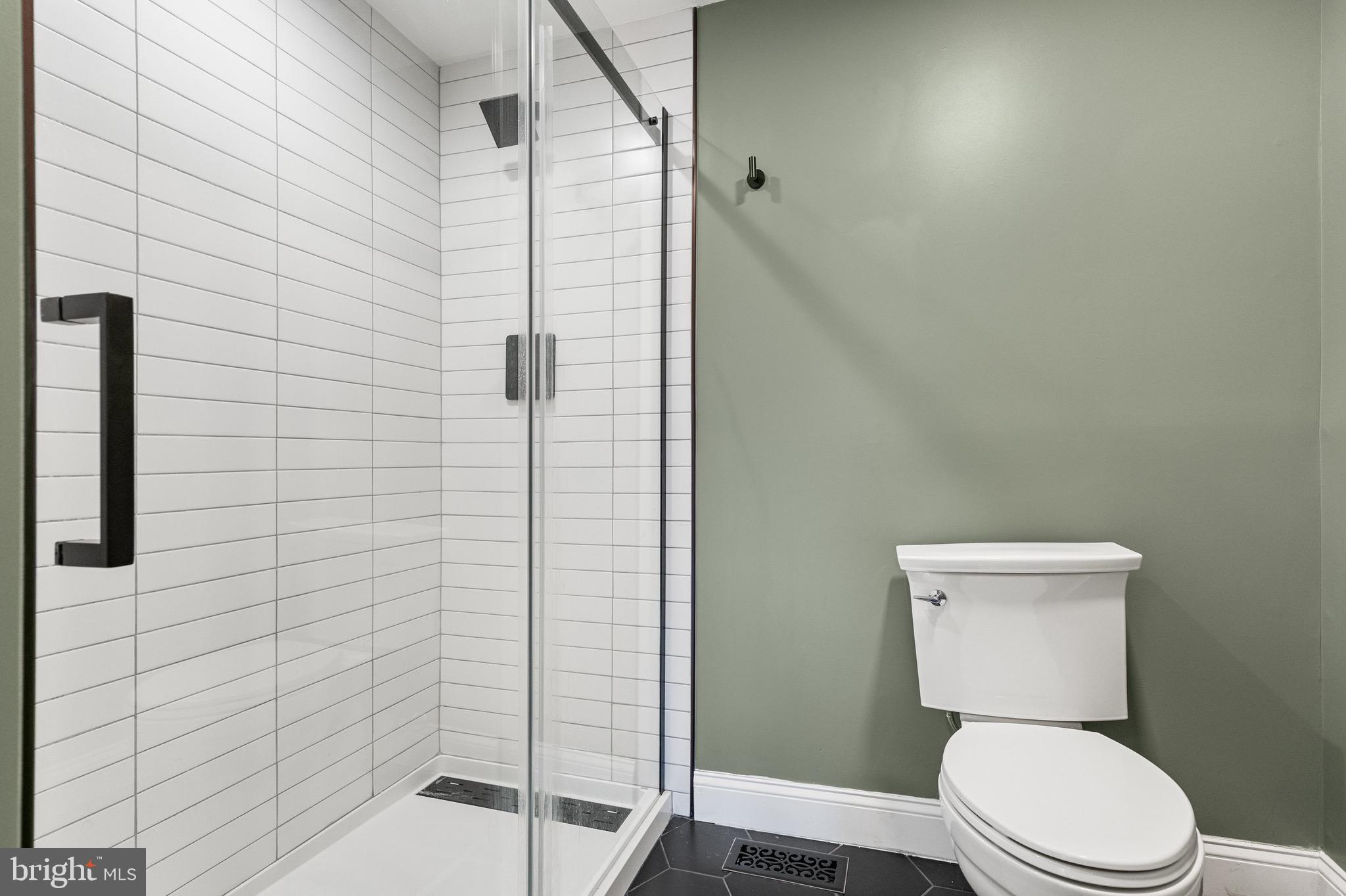 169 Canterbury Road Mount Laurel, NJ 08054 - Photo 30 of 47 a white toilet sitting next to a bathroom