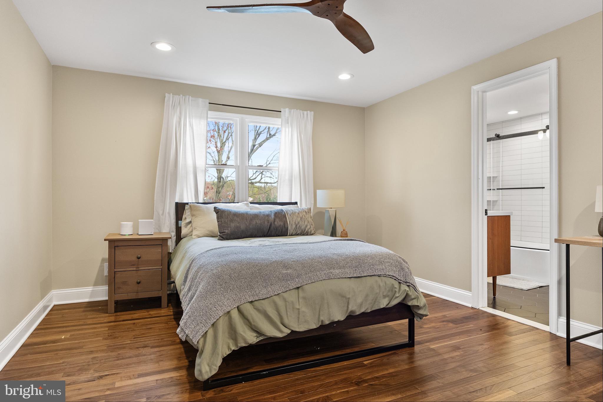 169 Canterbury Road Mount Laurel, NJ 08054 - Photo 31 of 47 a spacious bedroom with a bed and wooden floor