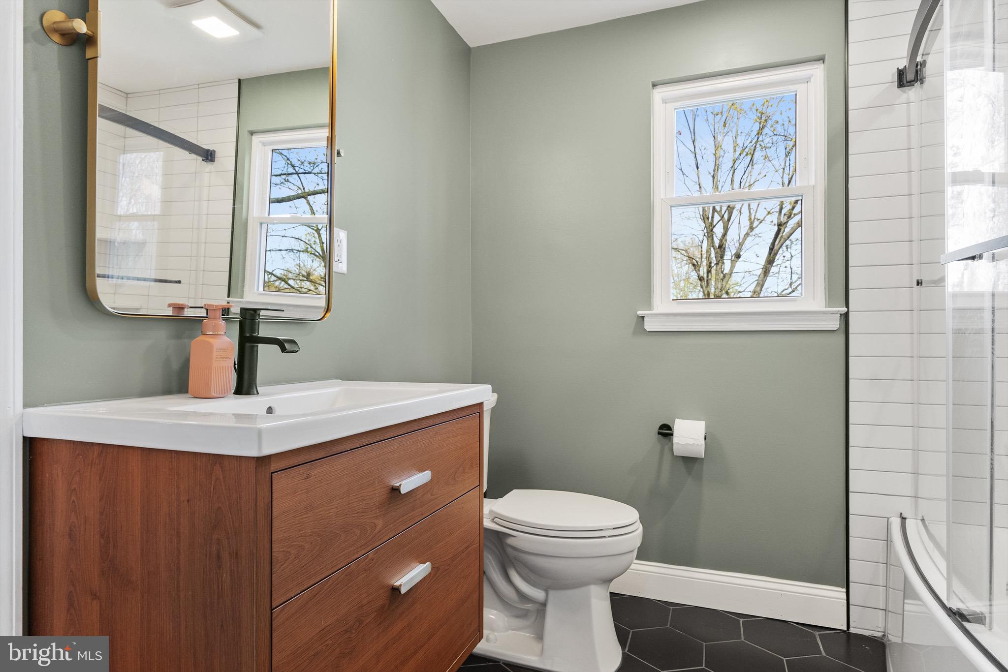 169 Canterbury Road Mount Laurel, NJ 08054 - Photo 32 of 47 a bathroom with a toilet sink and mirror