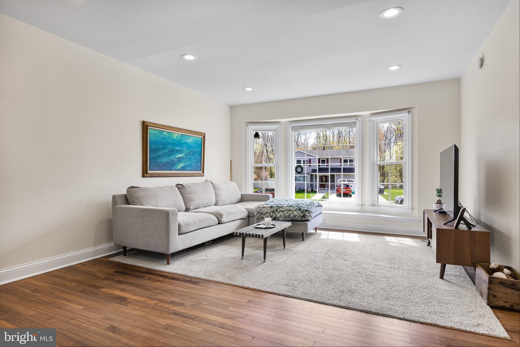 169 Canterbury Road Mount Laurel, NJ 08054 - Photo 7 of 47 a living room with furniture tv and a window
