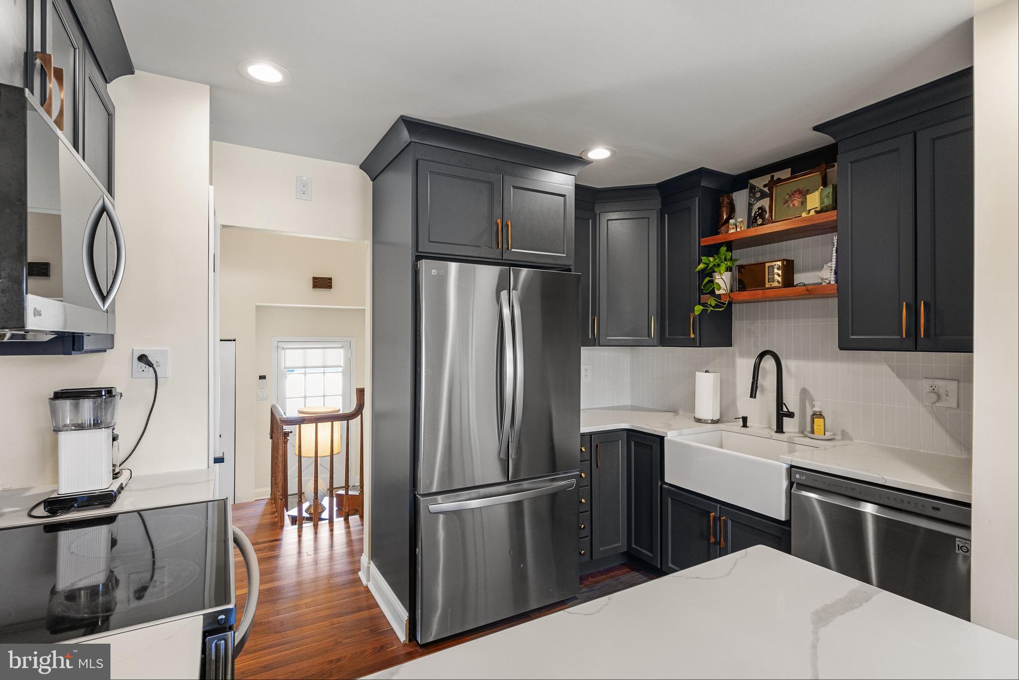 169 Canterbury Road Mount Laurel, NJ 08054 - Photo 10 of 47 a kitchen with stainless steel appliances a refrigerator sink and stove