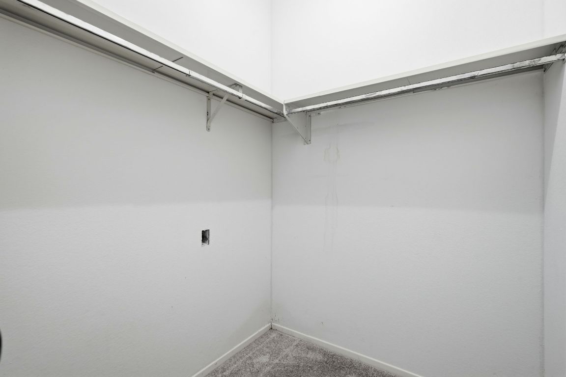 6501 Brush Country Road, Unit 120 Austin, TX 78749 - Photo 18 of 35 Walk in closet with carpet